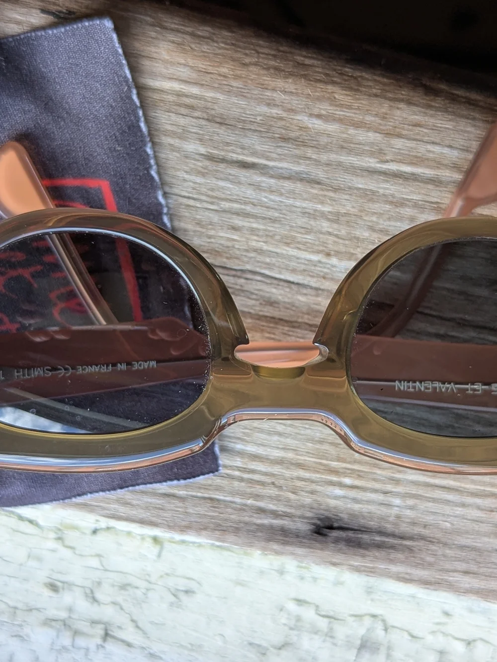 Anne Et Valentin Sunglasses with Brown/Olive Front And Peach temples.